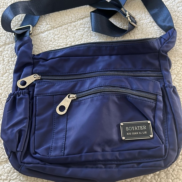 Soyater Crossbody bag NWOT in excellent condition with so many pockets (10) - Picture 4 of 5